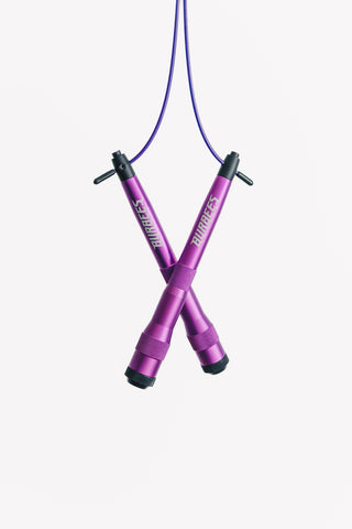 Buzz Rope -hyppynaru, violetti – kahvat ristissä valkoisella taustalla